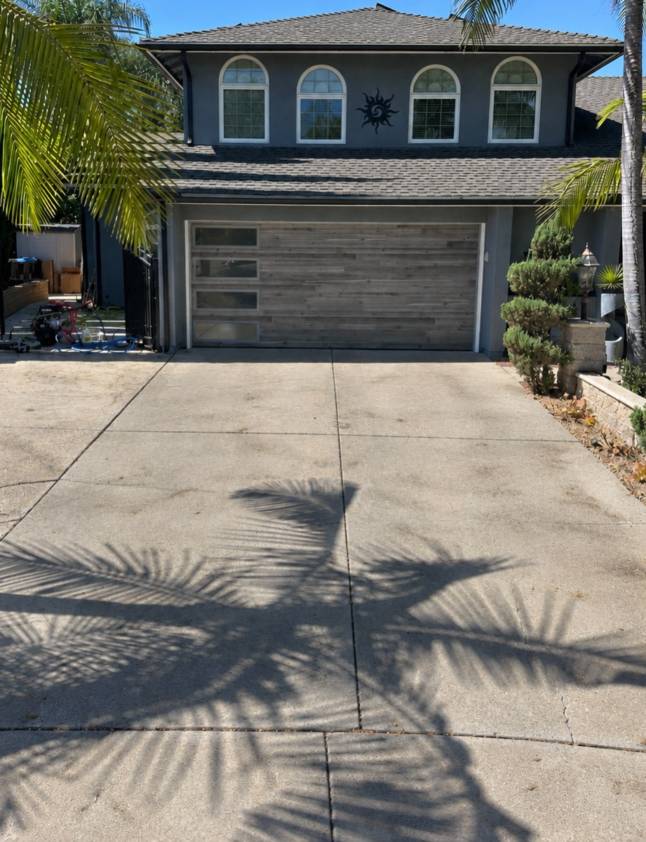 Driveway before pressure washing